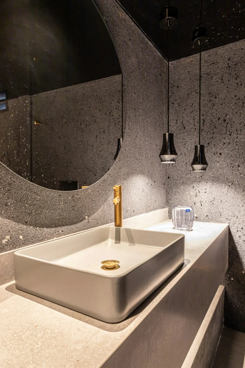 a bathroom with a large mirror