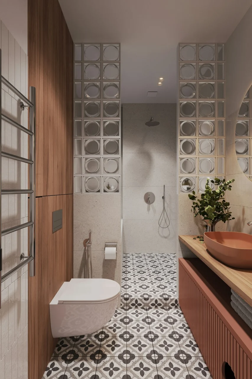 A bathroom with a sink, toilet and mirror
