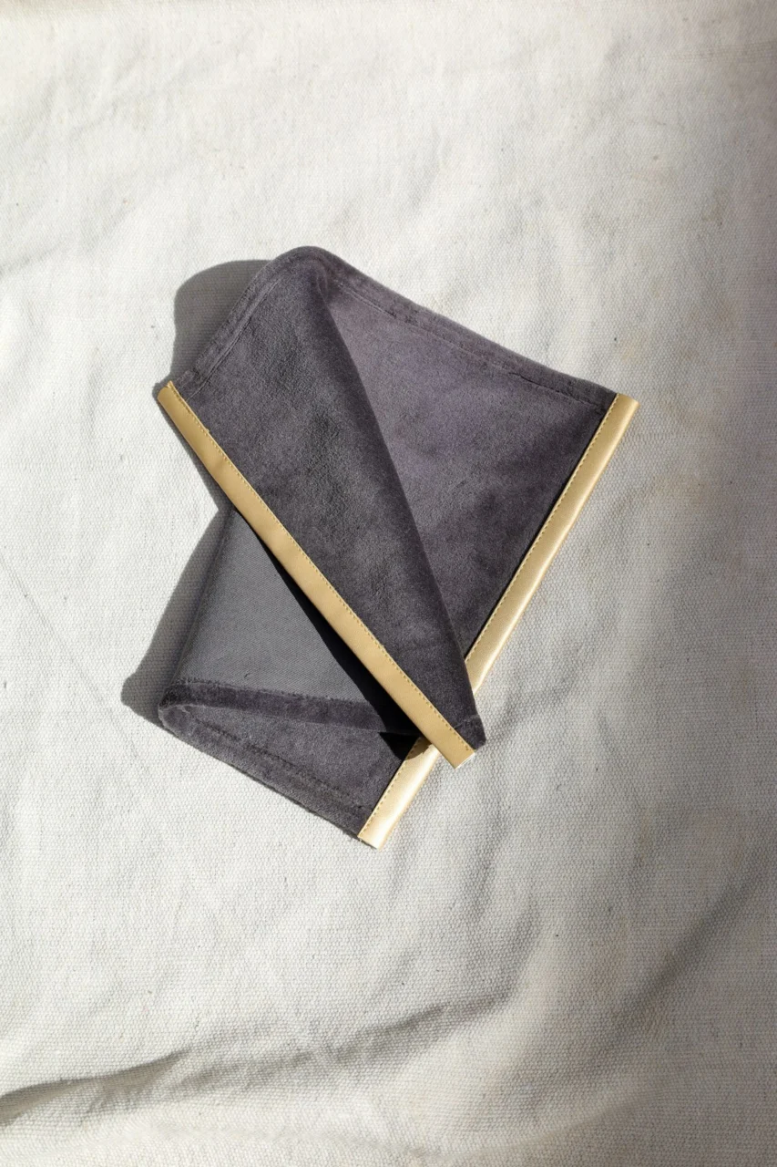 a black and yellow folded paper