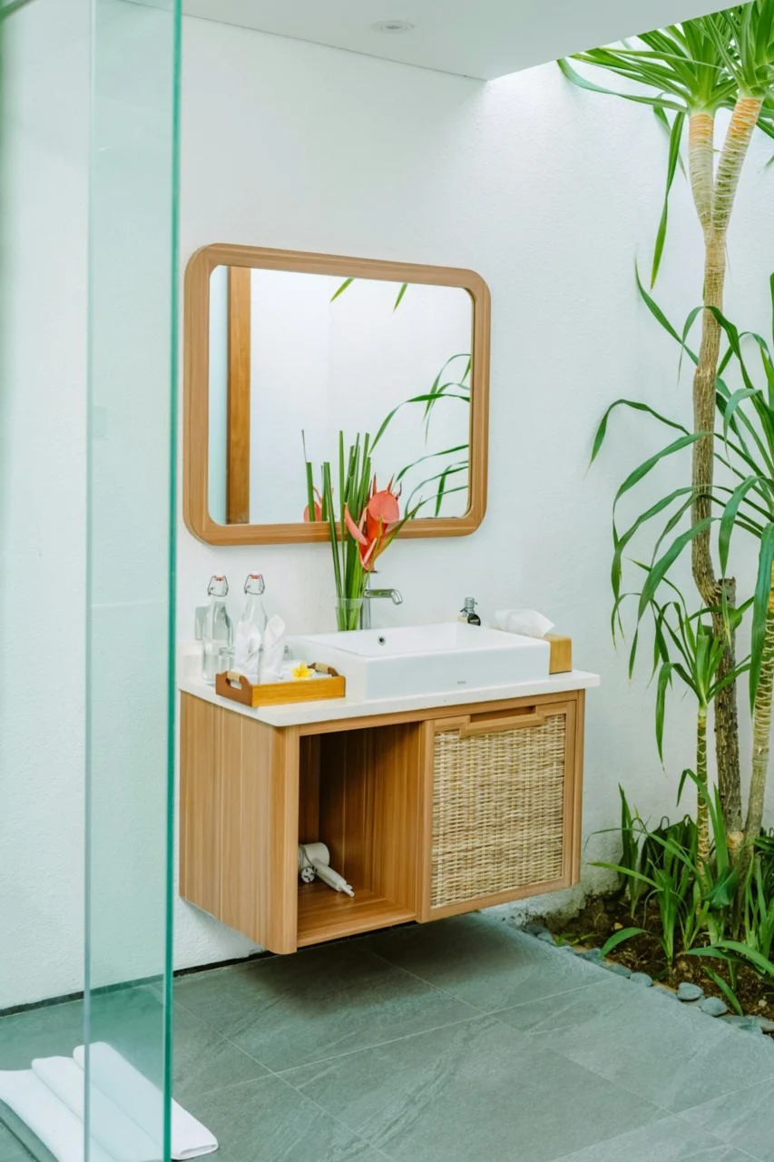 A bright and airy bathroom decorated with plants