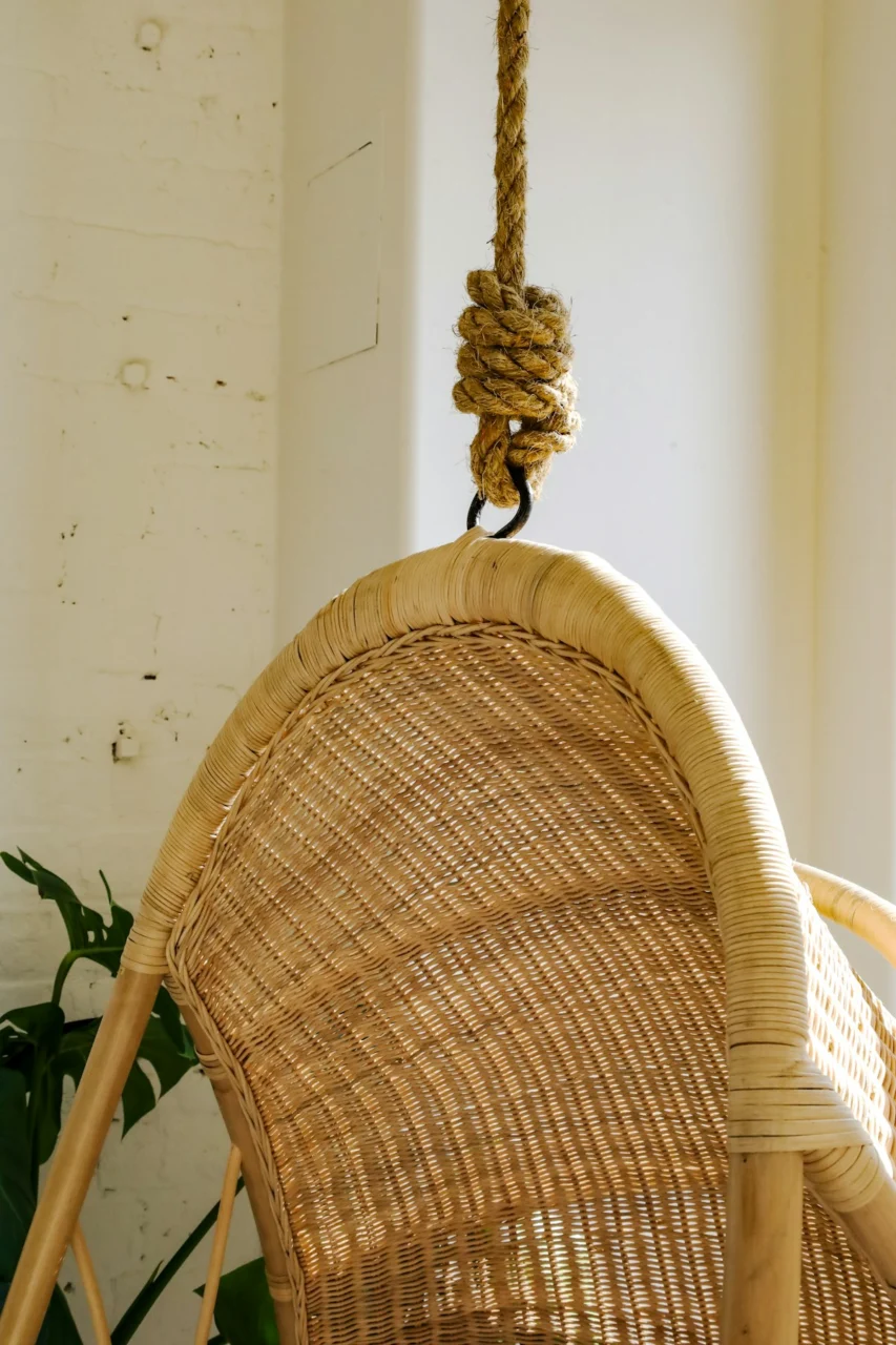 a chair with a gold object on it