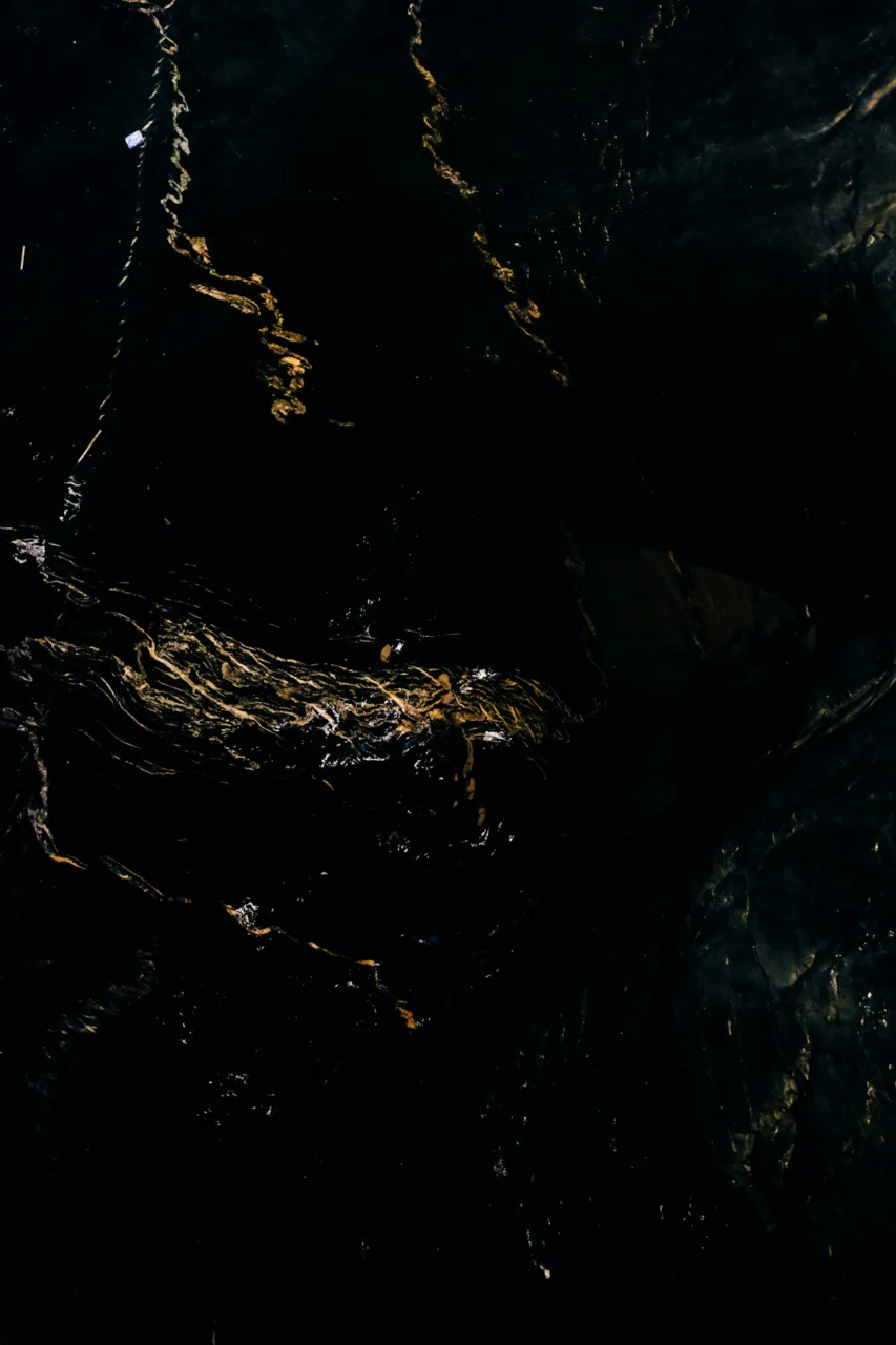 a close up of a cell phone with a dark background