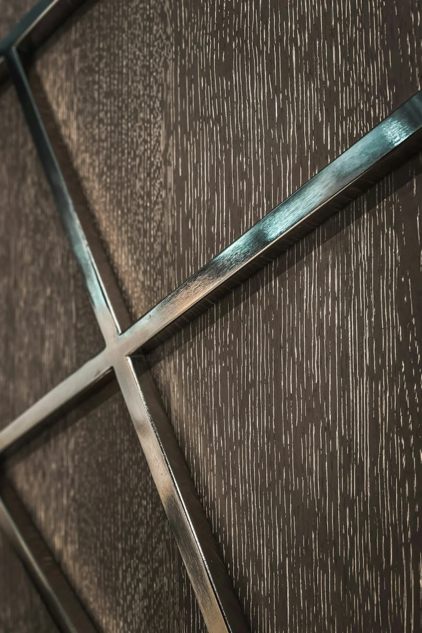 a close up of a metal object on a wall