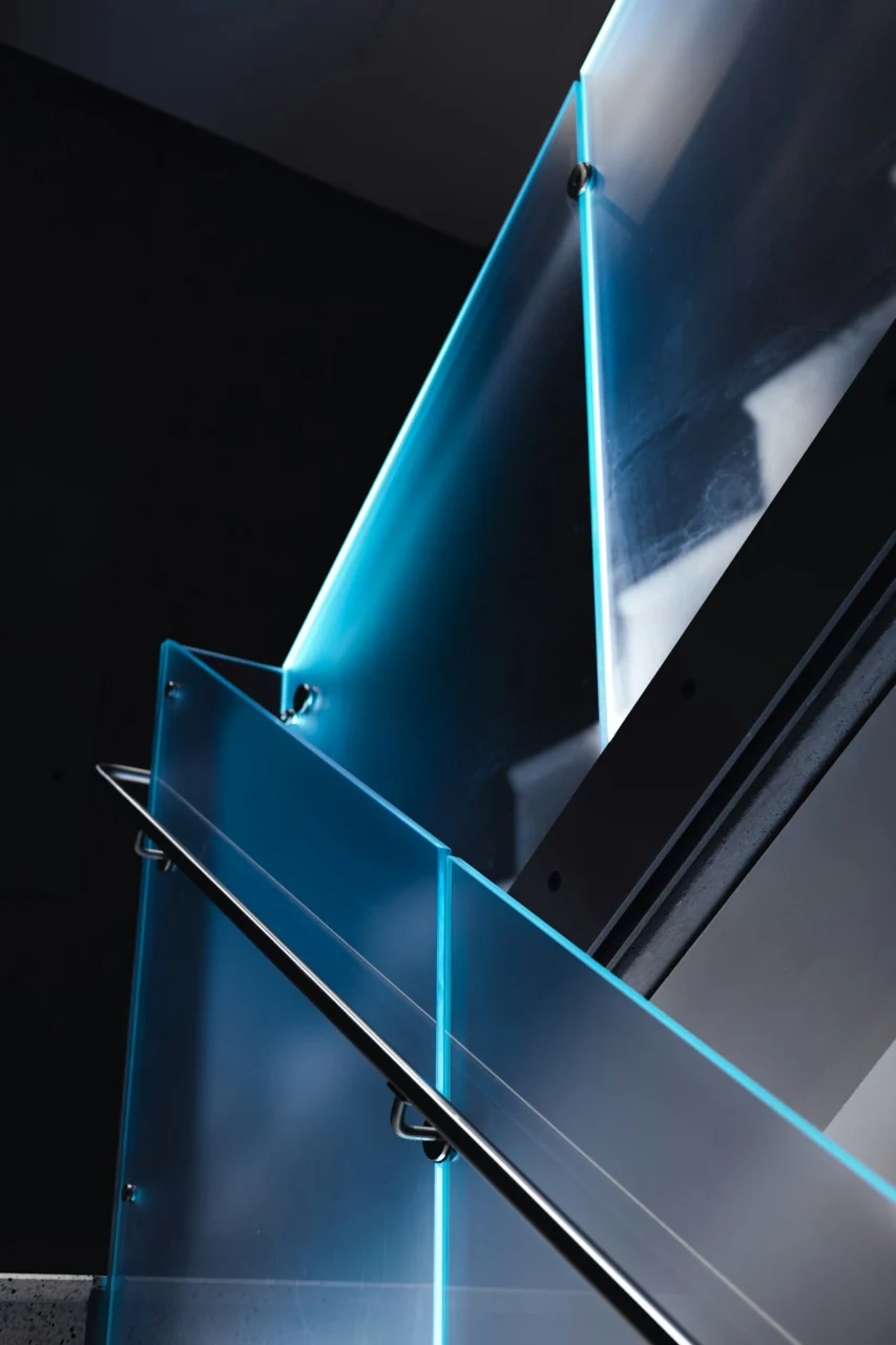 a close up of a metal object with blue lights