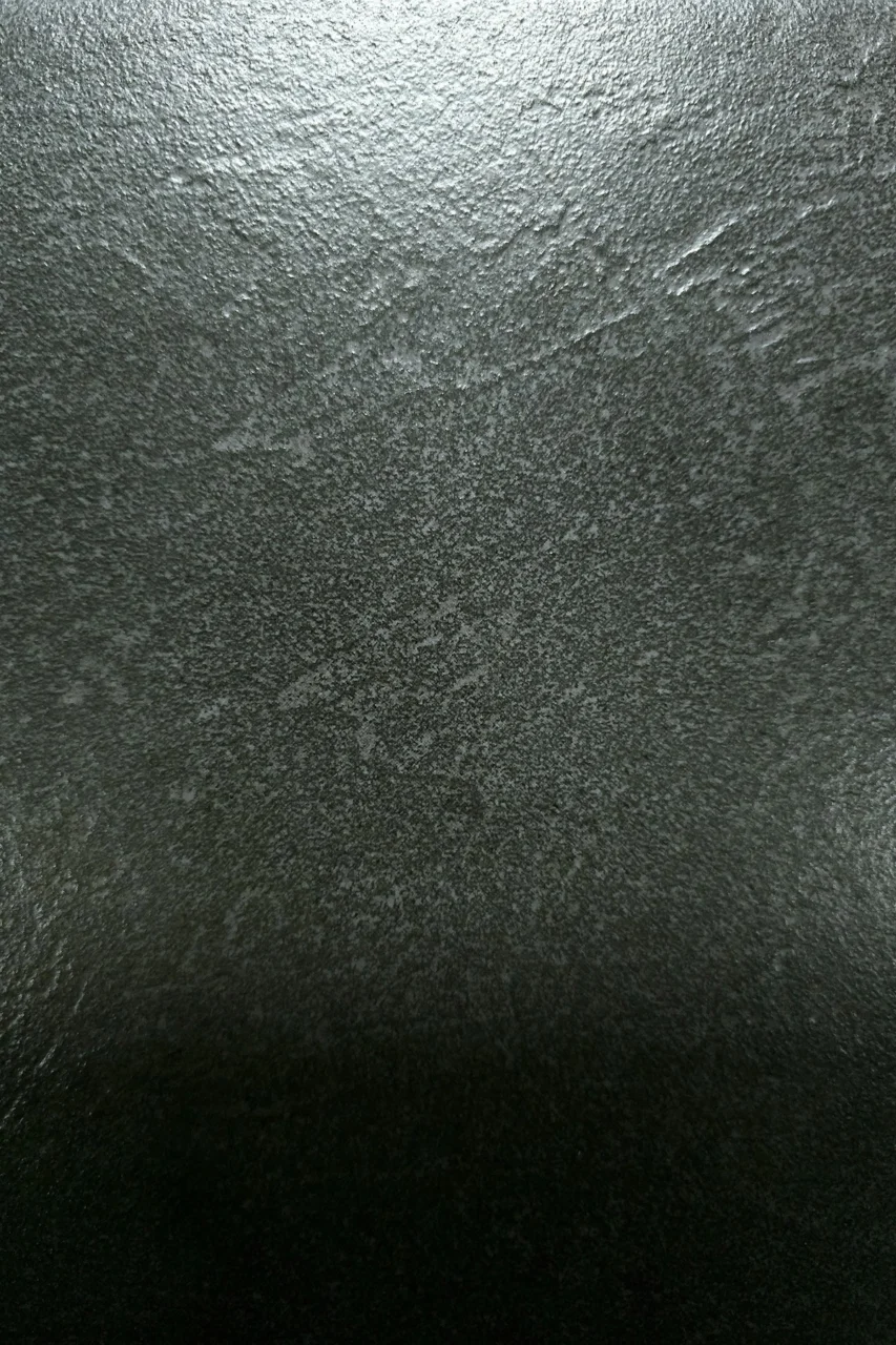 a close up view of a shiny metal surface