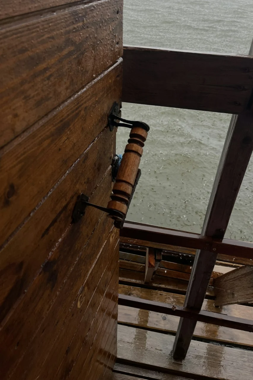 a gun on a wooden surface