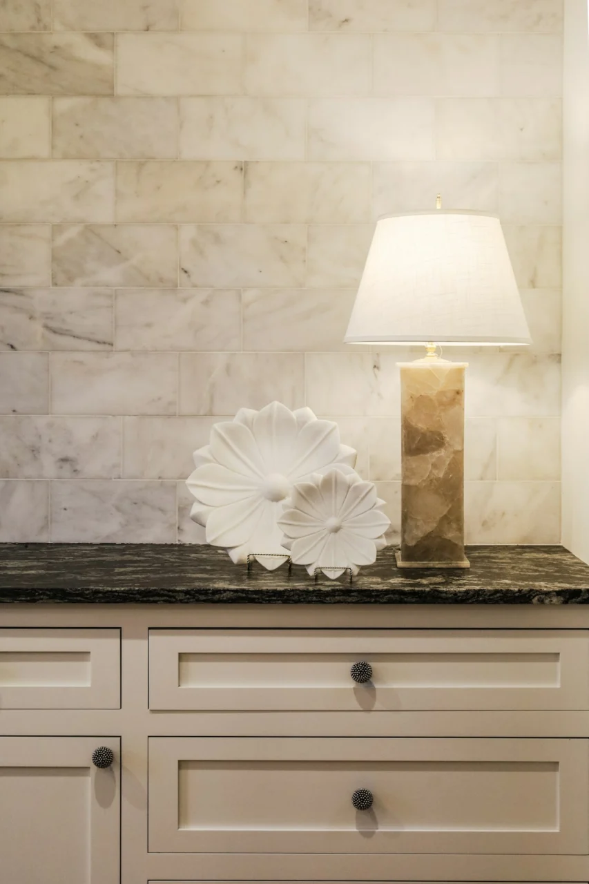 A lamp on a dresser