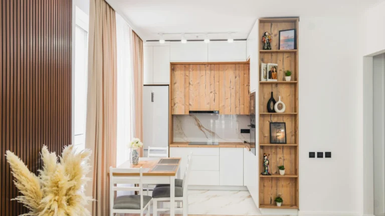 A modern kitchen and dining area with wooden accents