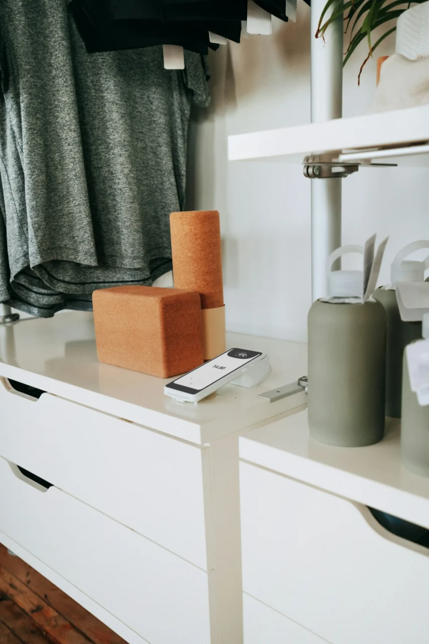 A retail space displays yoga blocks and apparel