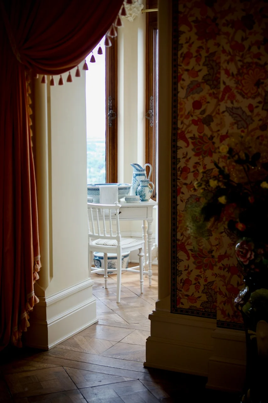 a room with a table and chairs