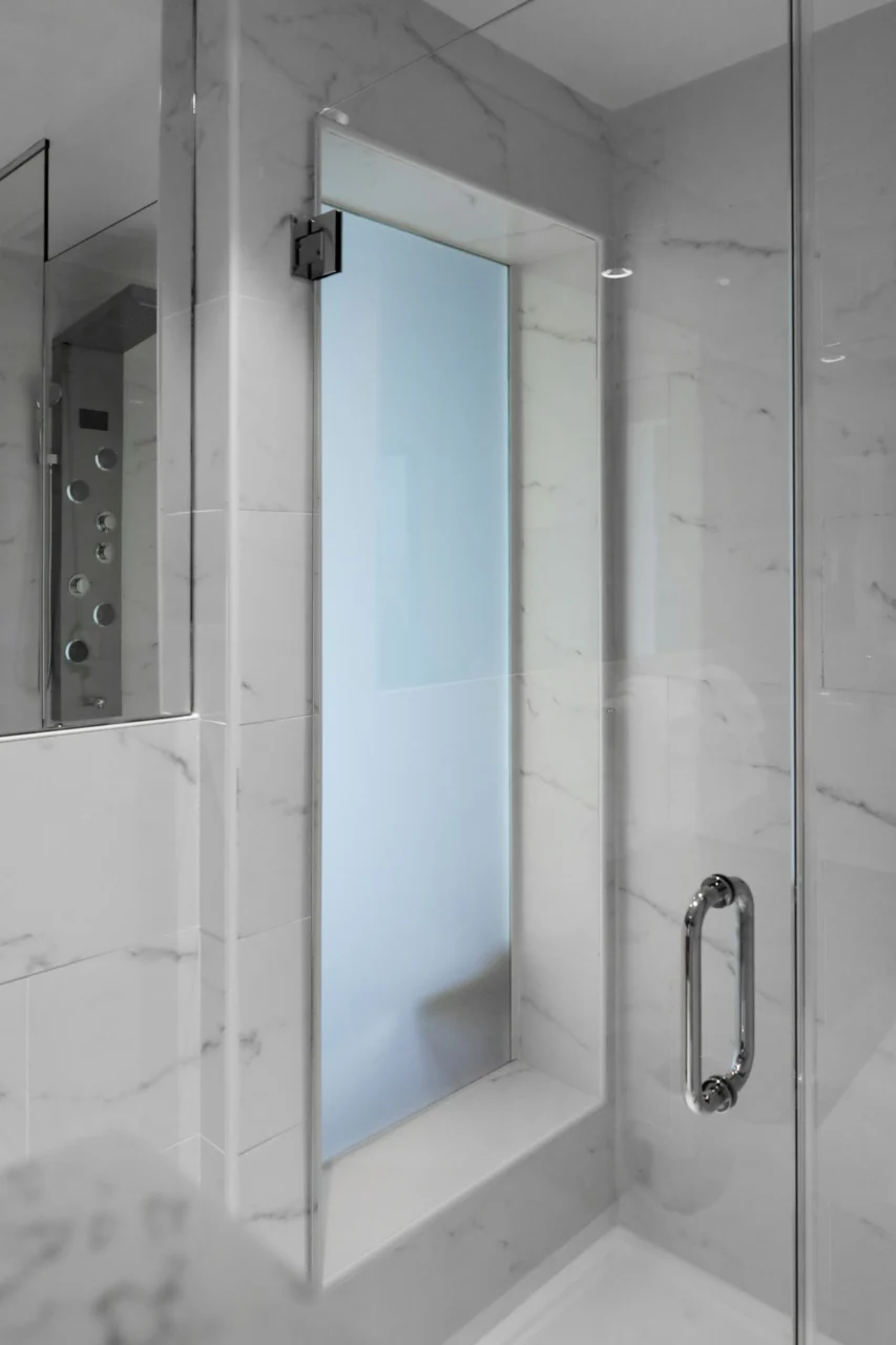 a shower with a glass door