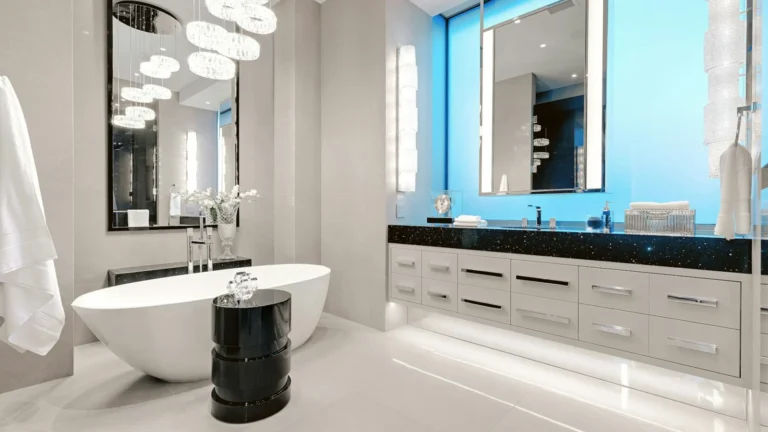 a white bath tub sitting next to a white sink