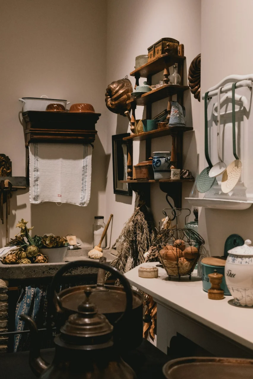 Antique kitchen with vintage cookware and utensils