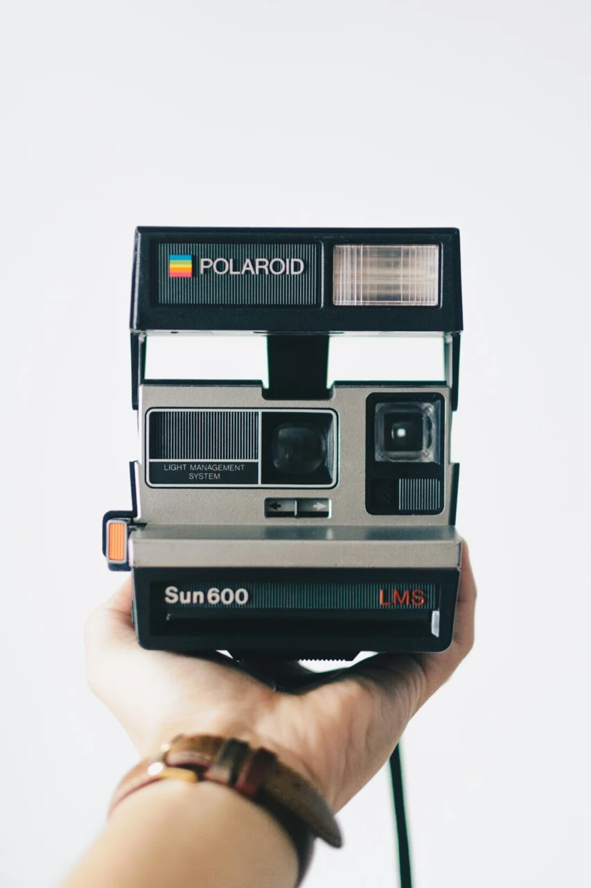 black and gray polaroid camera