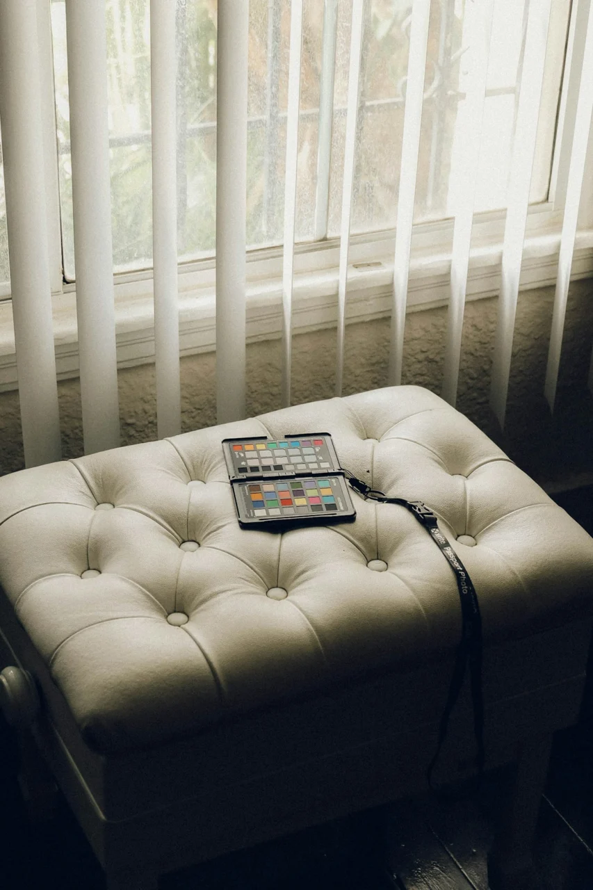 black ipad on white couch