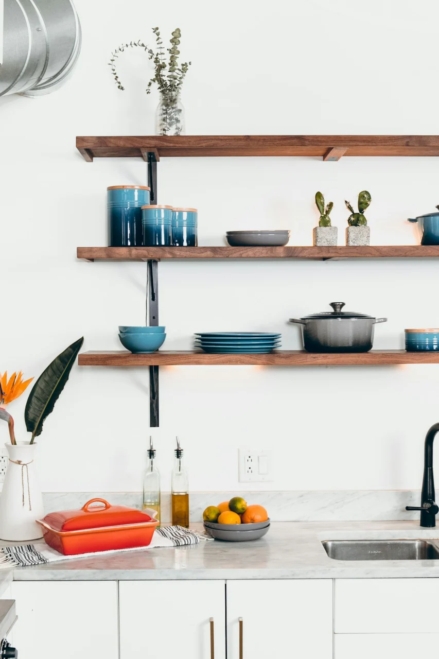 blue ceramic dinnerware on rack