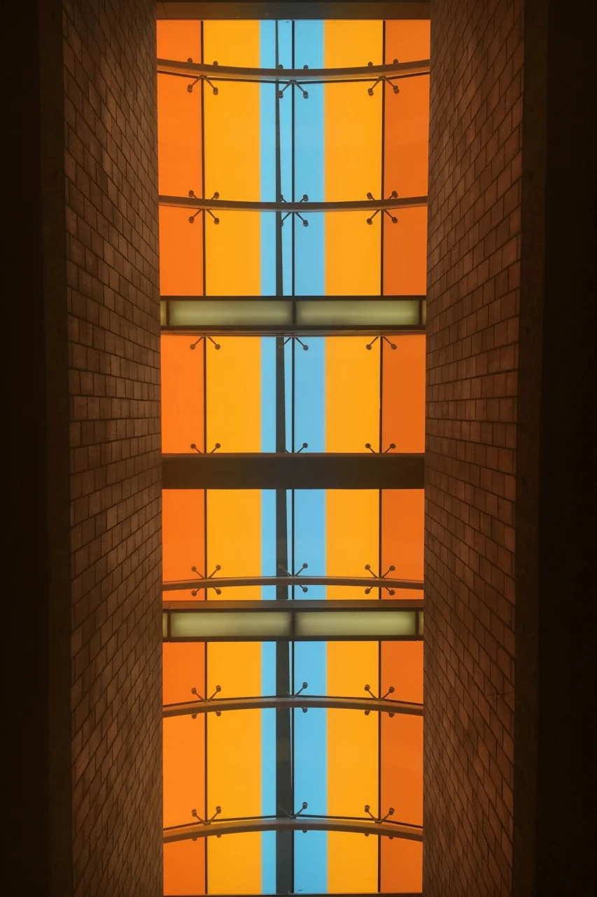 brown metal window frame during daytime