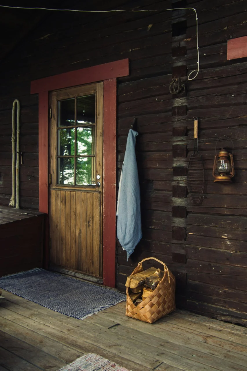 brown wooden door with gray textile hanging on it