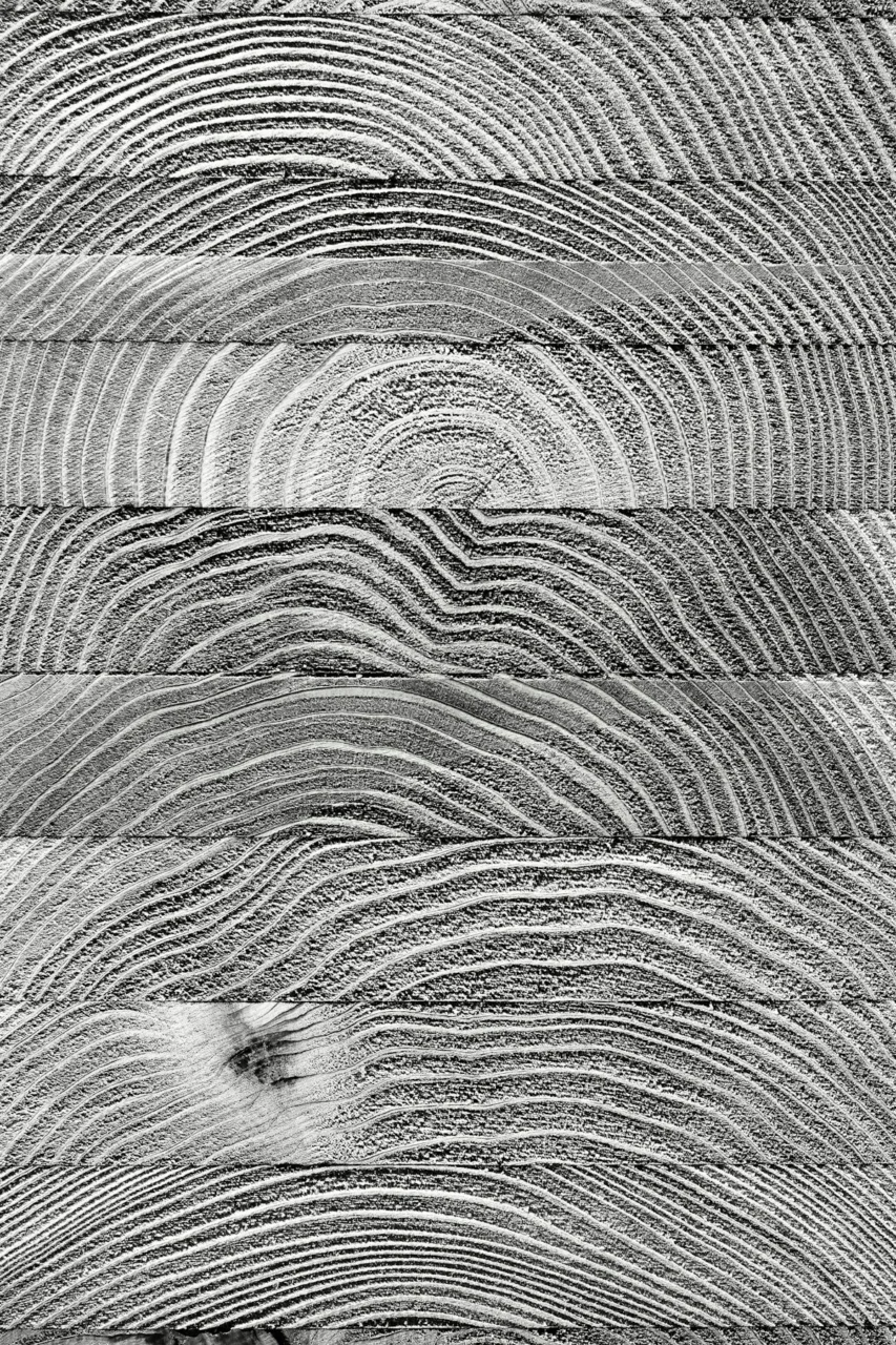 Close-up of stacked wood grain patterns