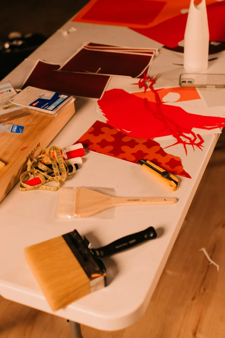 Crafting supplies spread on a white table