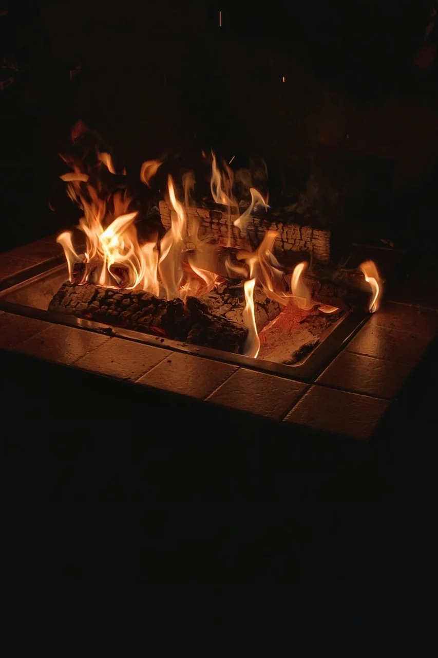 fire on brown wooden table