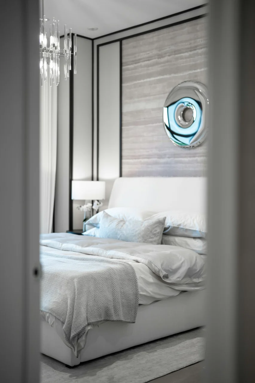 Luxurious bedroom with a large bed and modern decor
