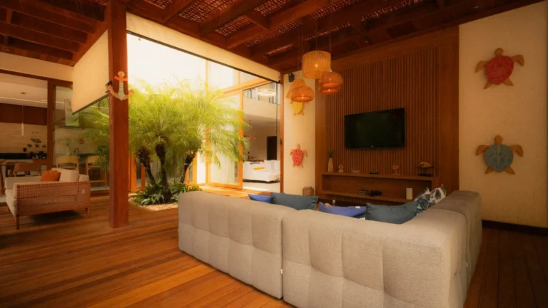 Modern living room with large couch and indoor plants