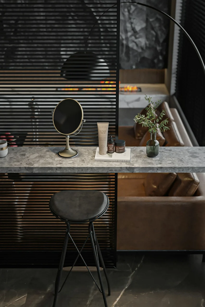 Modern vanity area with stool and sofa