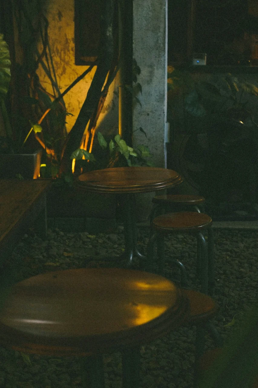 Outdoor cafe tables and chairs at night