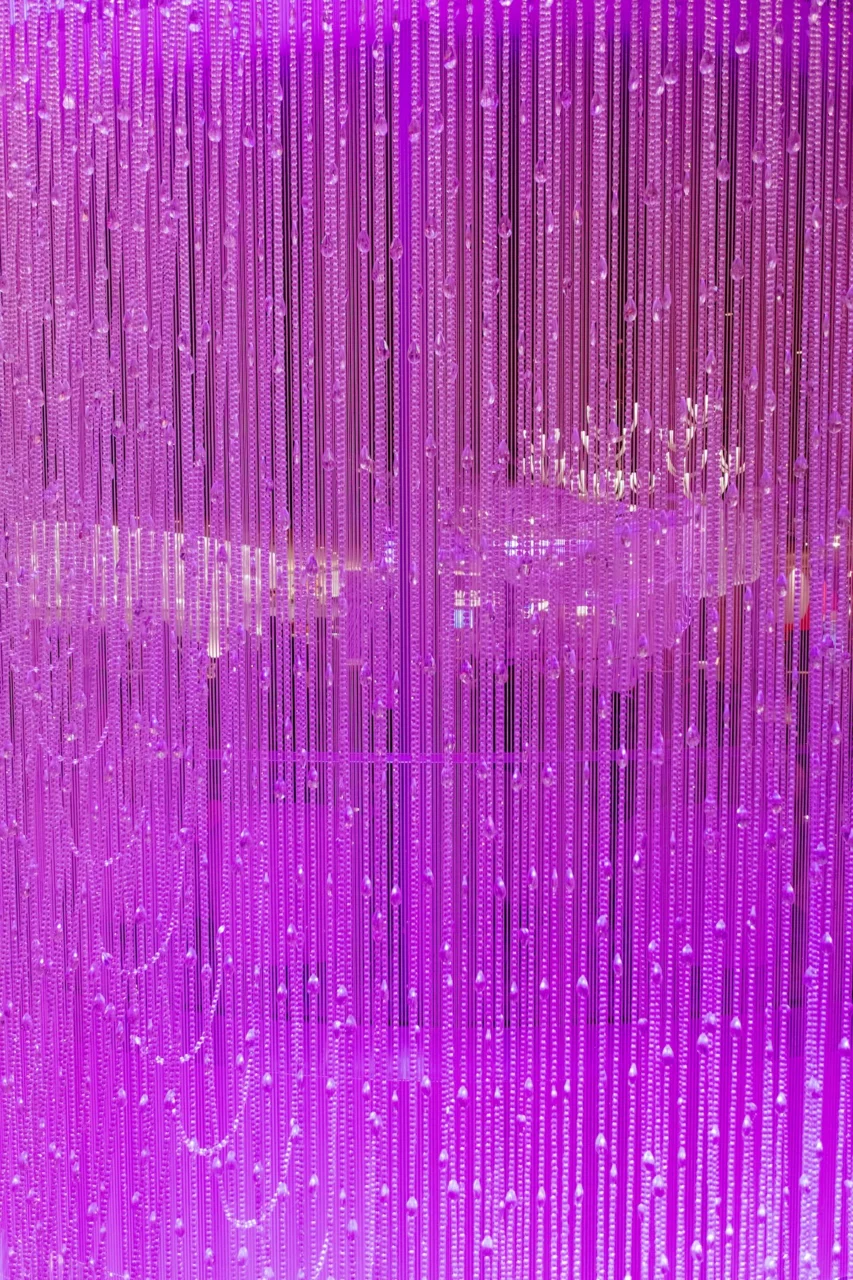 Purple beaded curtain with soft light