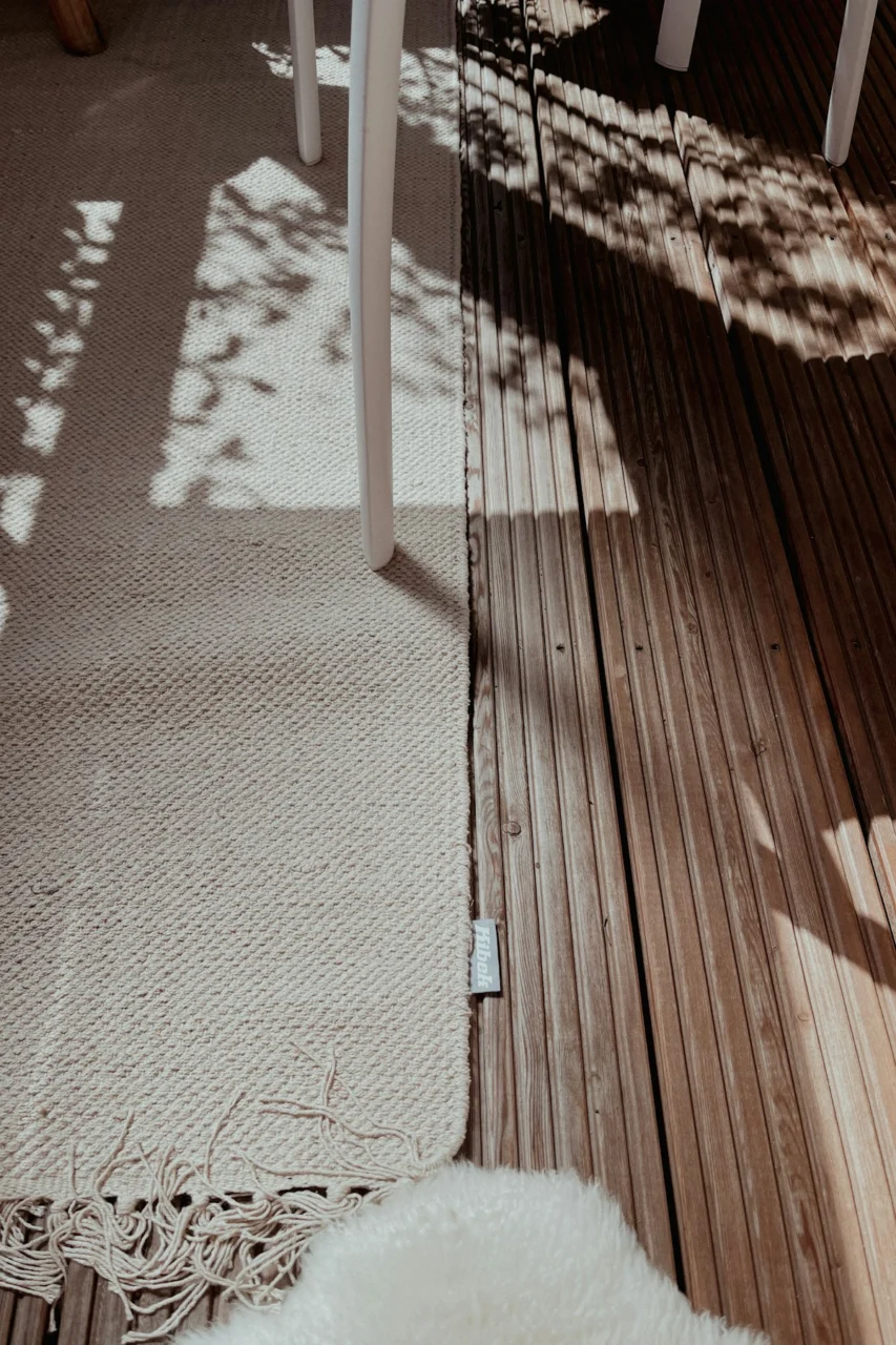 shadow of person on wooden floor