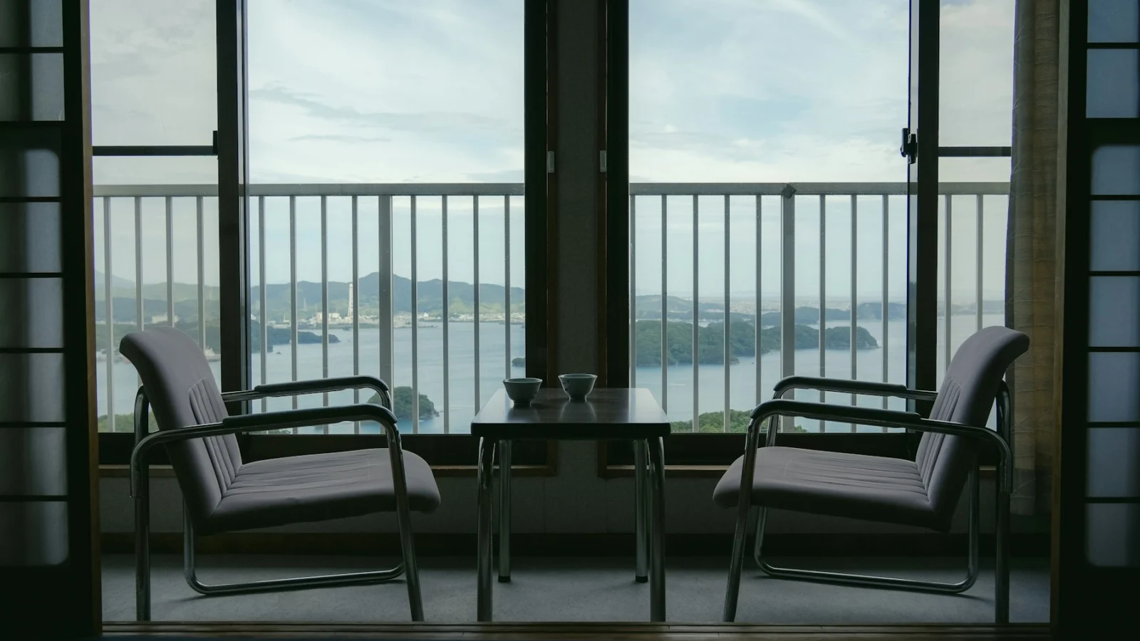 Two chairs and table overlook ocean view