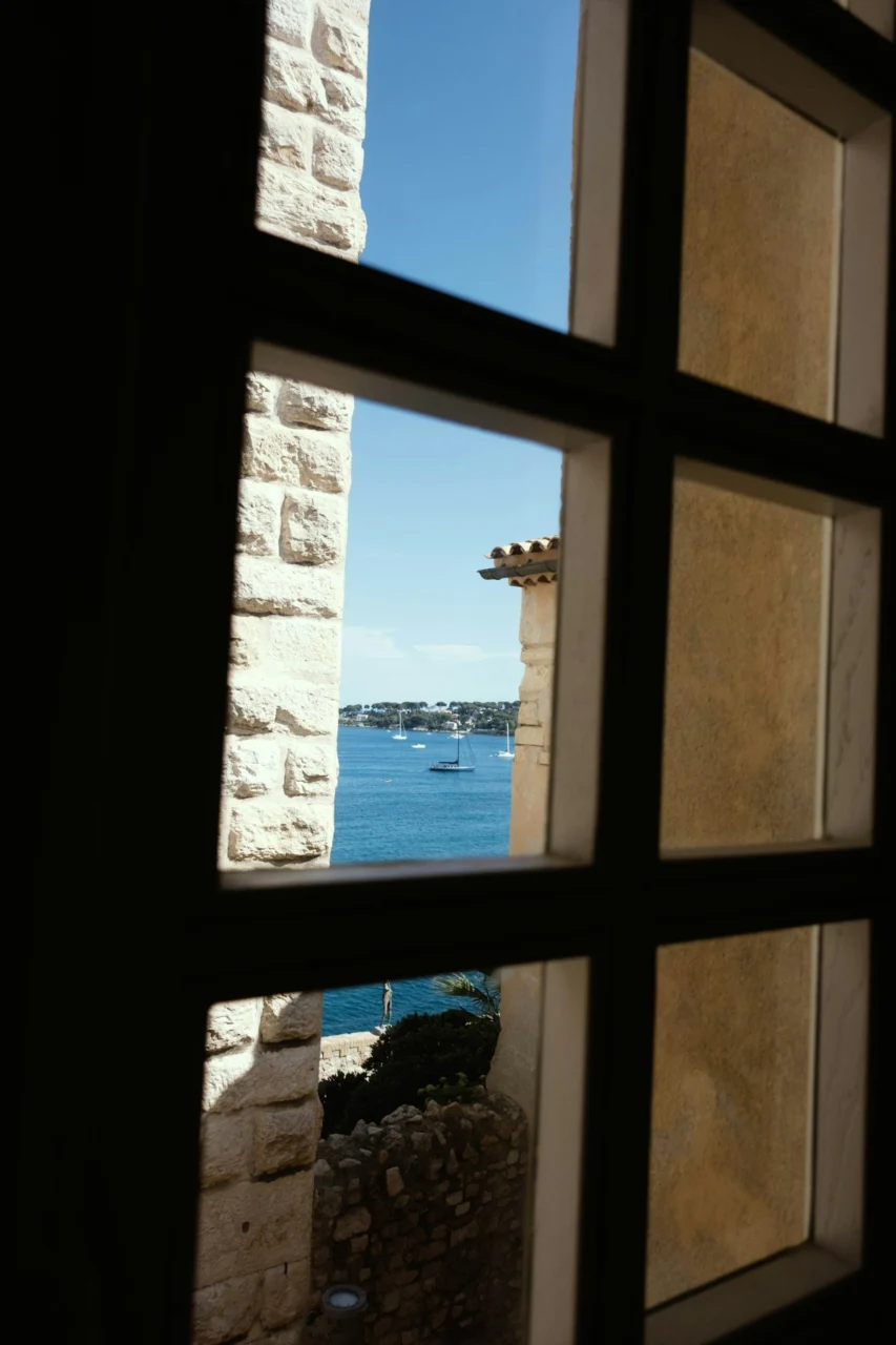 View of the ocean through a window
