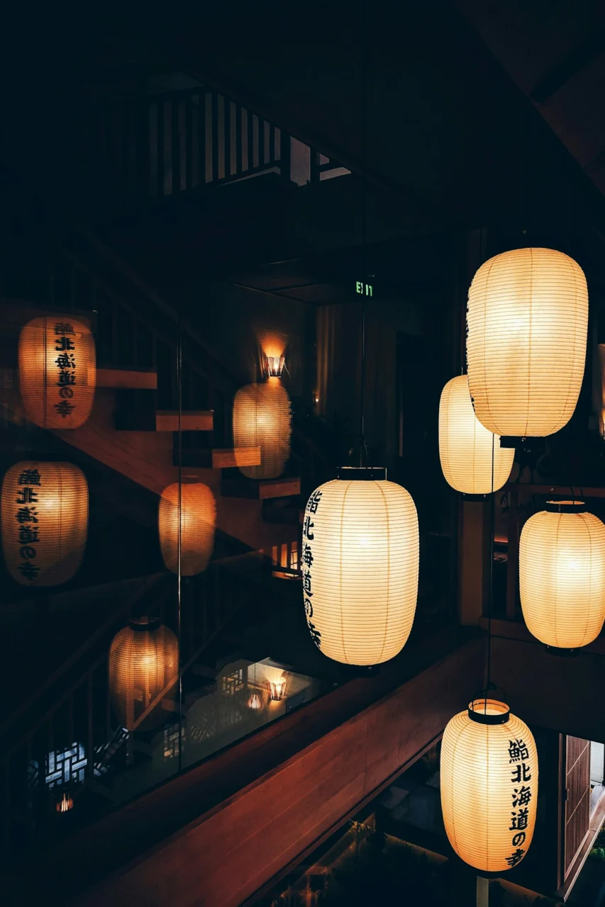 white and black lantern lamp turned-on