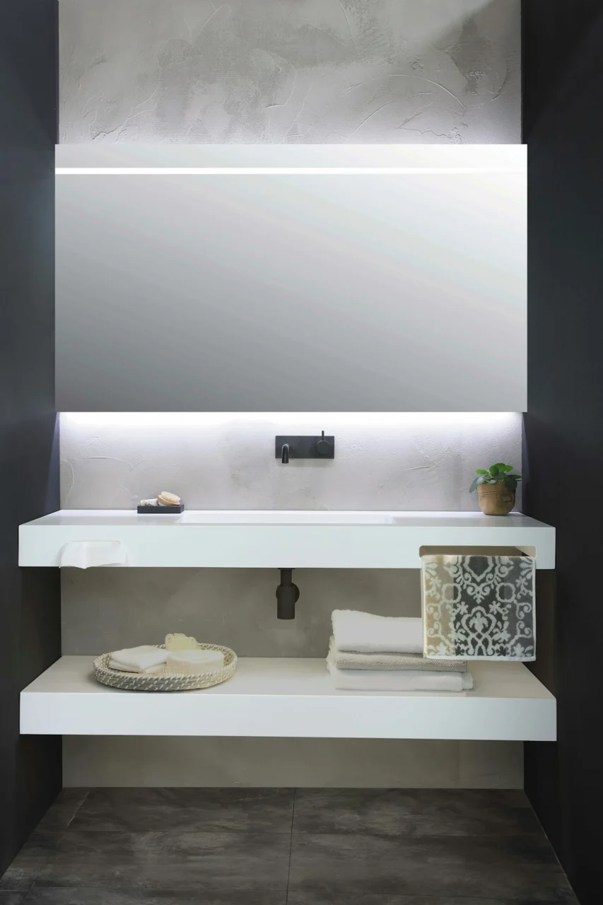 white ceramic sink with faucet