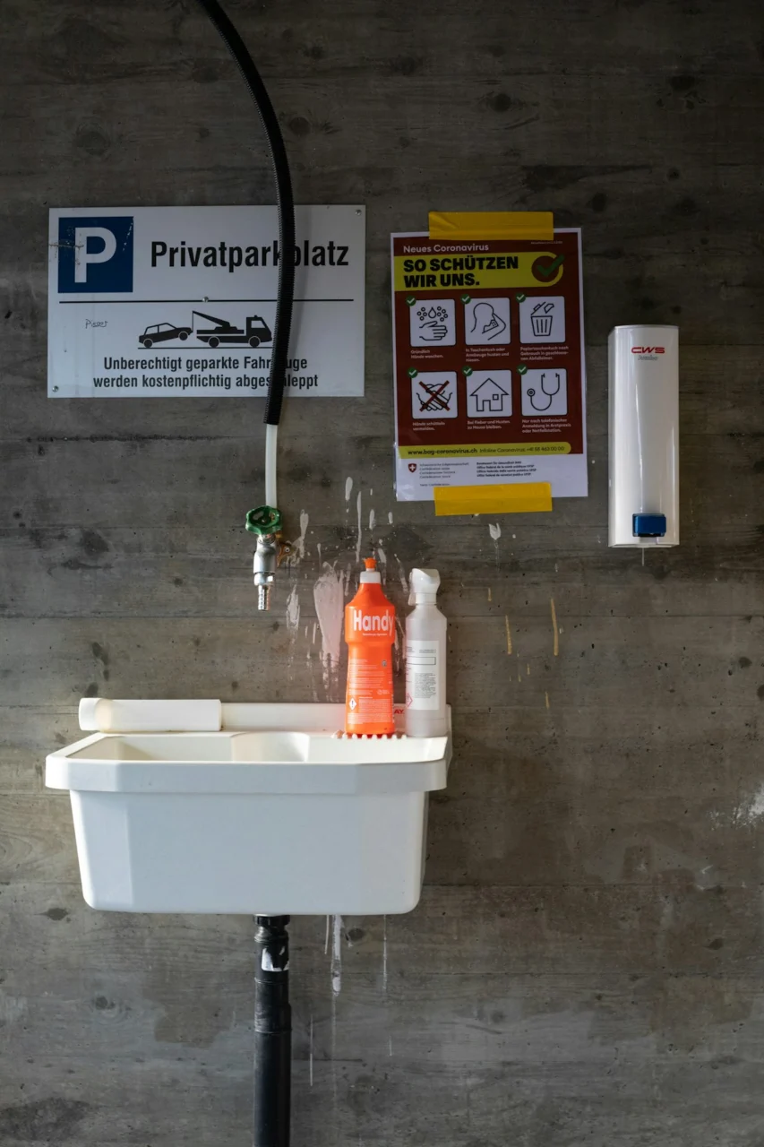 white plastic container with orange liquid