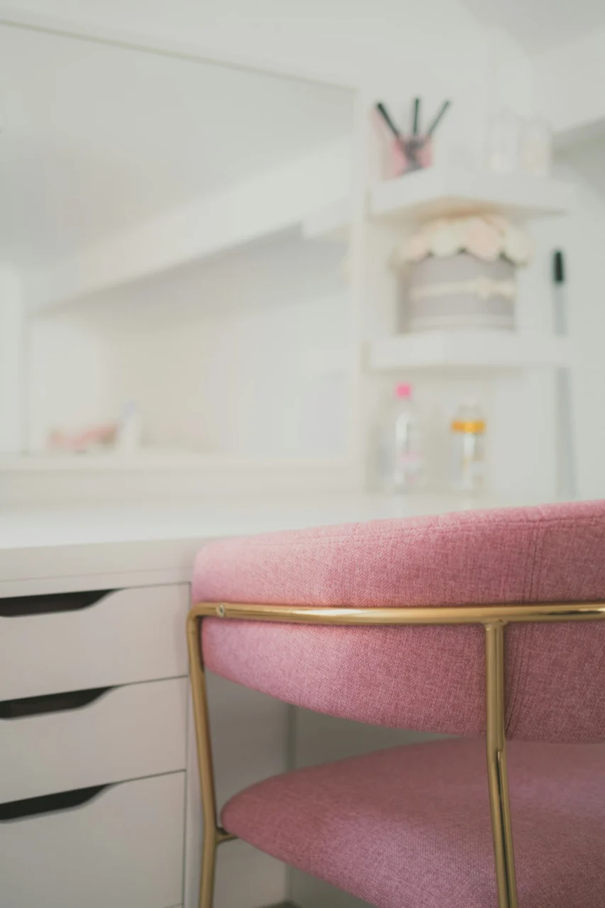 white wooden drawer with pink cushion