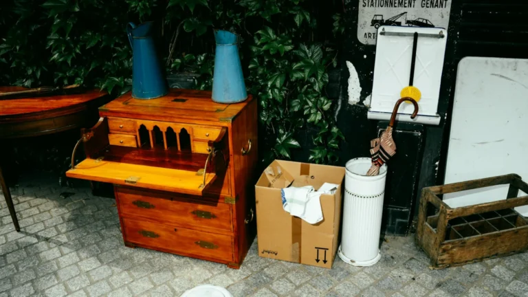 Wooden music box with blue horns and assorted items