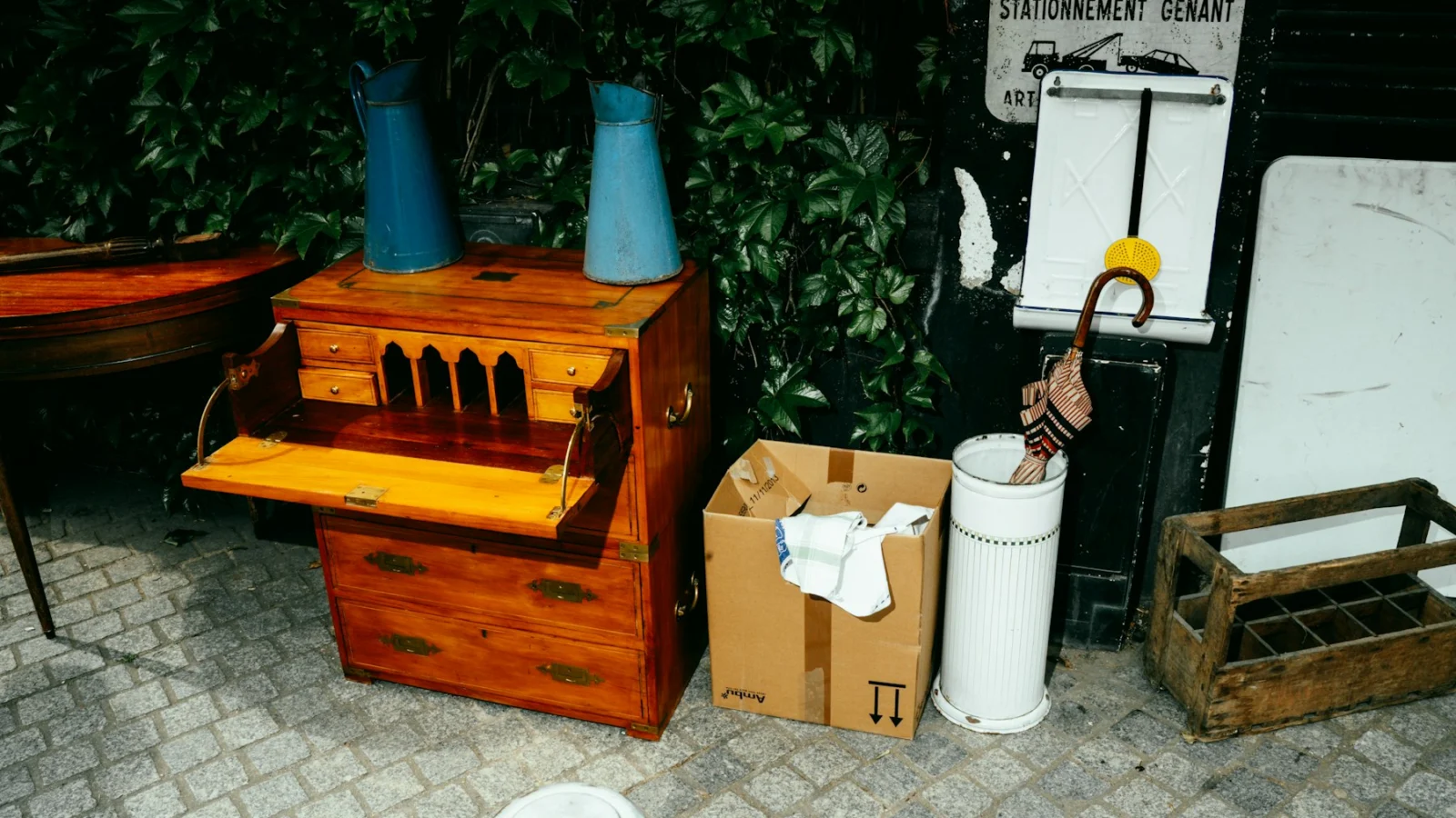 Wooden music box with blue horns and assorted items